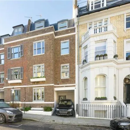 Buy this 4 bed townhouse on 26 Campden Hill Gardens in London, W8 7AY