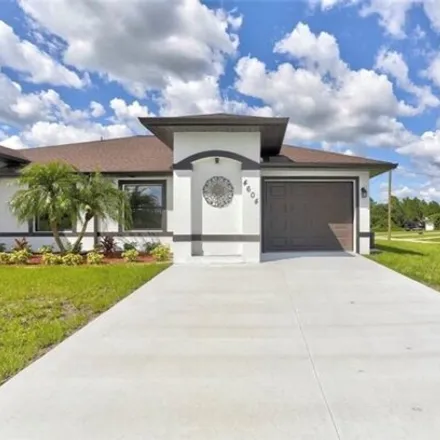 Rent this 3 bed house on 4520 29th St SW in Lehigh Acres, Florida