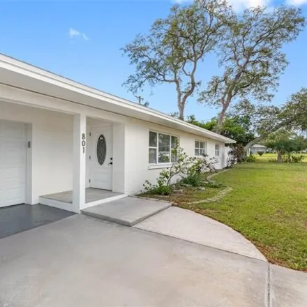 Buy this 4 bed house on 801 Sherman Mcveigh Dr in Clearwater, Florida