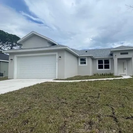 Rent this 4 bed house on 1286 Hastings Road Southwest in Palm Bay, FL 32908