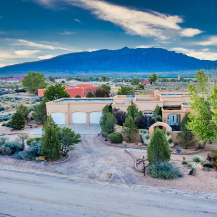 Buy this 4 bed house on 6206 Lupin Road Northeast in Rio Rancho, NM 87144