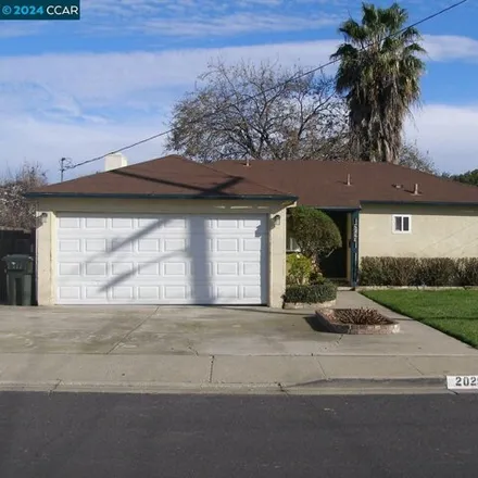 Rent this 3 bed house on 2067 Woodland Drive in Antioch, CA 94509