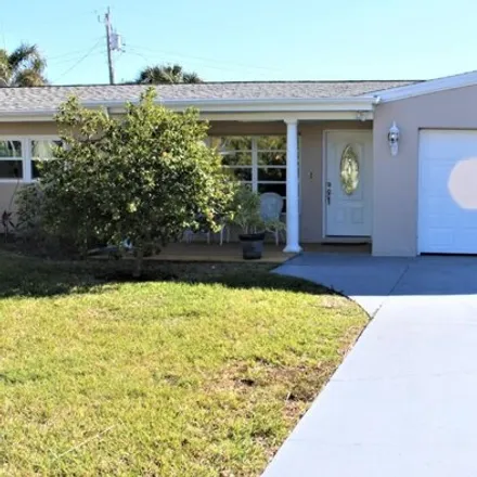 Rent this 3 bed house on 269 Ellwood Avenue in Satellite Beach, FL 32937
