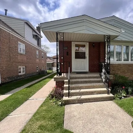 Buy this 3 bed house on 5336 South McVicker Avenue in Chicago, IL 60638