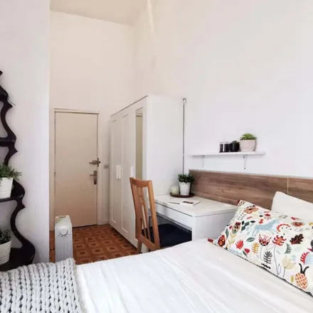 Rent this 4 bed room on Rastro Market in Calle San Cayetano, 28005 Madrid
