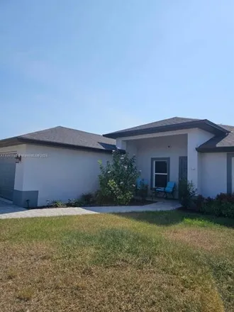Rent this 3 bed house on 1320 Northeast 12th Place in Cape Coral, FL 33909
