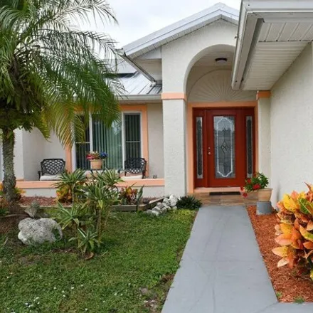 Buy this 4 bed house on 1872 Emerson Drive Southeast in Palm Bay, FL 32909
