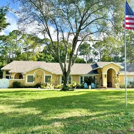 Buy this 5 bed house on 14875 Stirrup Lane in Wellington, FL 33414
