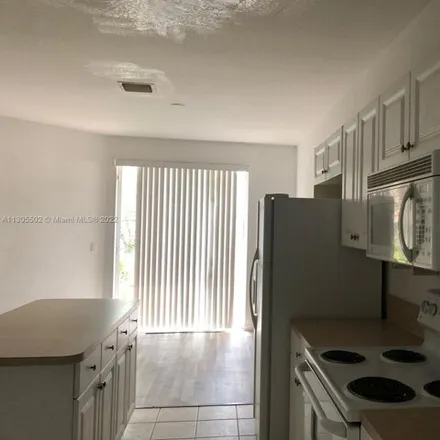 Image 2 - 3298 Mirella Drive, Riviera Beach, FL 33404, USA - Townhouse for sale