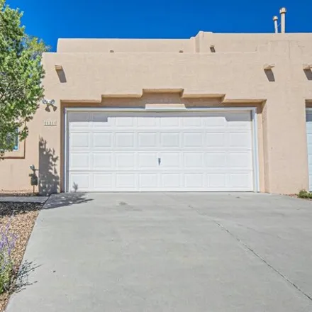 Rent this 3 bed townhouse on 11311 Campo del Oso Avenue Northeast in Albuquerque, NM 87112