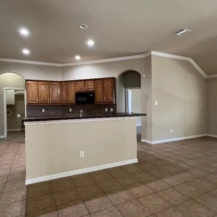 Rent this 4 bed apartment on 5817 Sunny Meadow Lane in Heather Glen, Grand Prairie