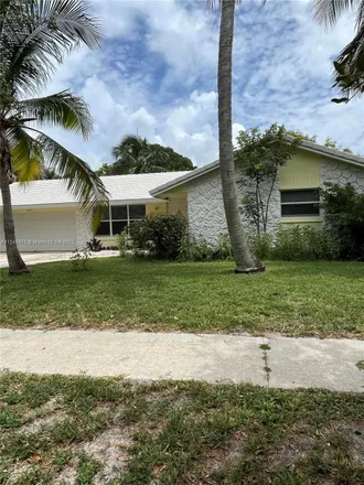 Buy this 3 bed house on 4441 Northwest 3rd Court in Coconut Creek, FL 33066