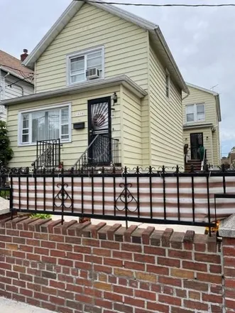 Buy this 2 bed house on 1650 85th Street in New York, NY 11214