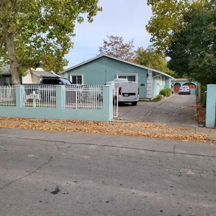 Buy this 4 bed house on Beaumont Street Empress Street Alley in Sacramento, CA 95813