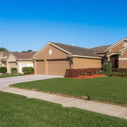 Buy this 4 bed house on 29492 Allegro Drive in Pasco County, FL 33543