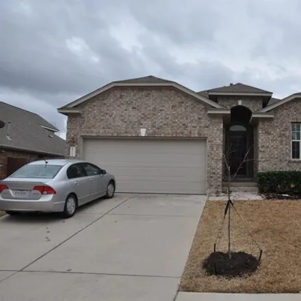 Rent this 3 bed house on 216 Tulip Trail Boulevard in Cedar Park, TX 78613