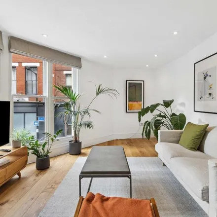 Rent this 3 bed townhouse on Bishopsgate Telephone Exchange in Jerome Street, Spitalfields