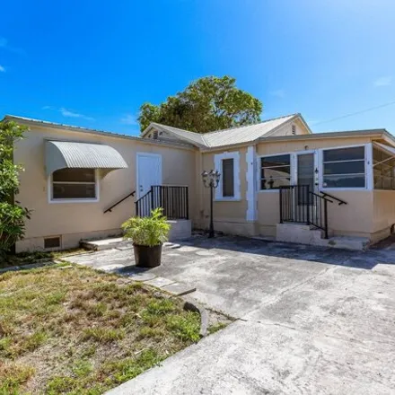 Buy this 2 bed house on 1381 12th Avenue North in Lake Worth Beach, FL 33460