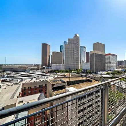 Rent this 2 bed condo on Christian's Tailgate Bar & Grill in 2000 Bagby Street, Houston