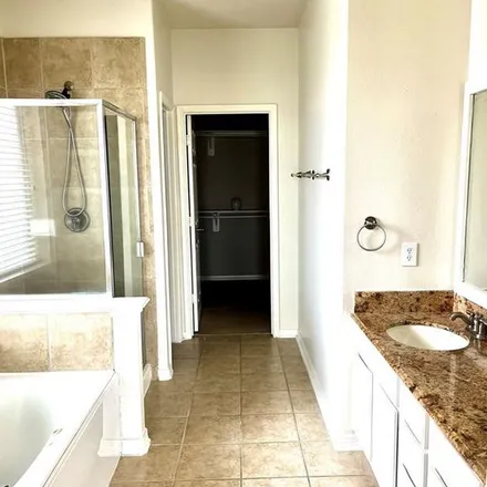 Rent this 4 bed apartment on 18001 Blues Point Drive in Cypress, TX 77429
