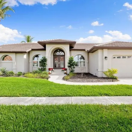 Buy this 3 bed house on 15422 Catalpa Cove Drive in Iona, FL 33908