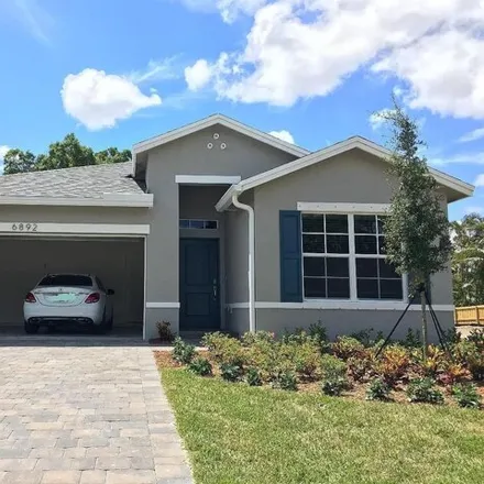 Rent this 4 bed house on 6892 Church St in Jupiter, Florida