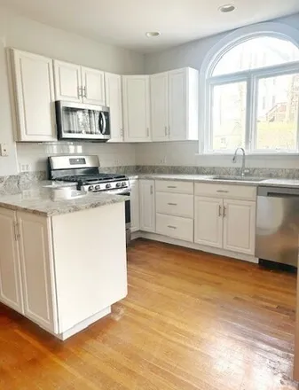 Rent this 5 bed townhouse on 105 Pleasant Street in Woburn, MA 01801
