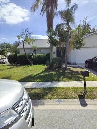 Rent this 3 bed house on 213 Woodbridge Dr in Jupiter, Florida