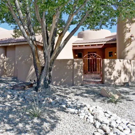 Buy this 3 bed house on 3625 Greystone Ridge Drive Southeast in Rio Rancho, NM 87124