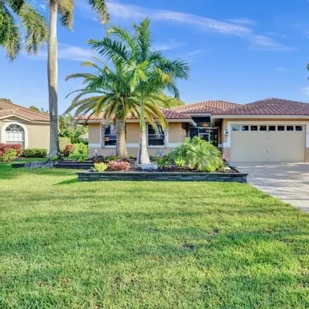 Buy this 5 bed house on 4997 Northwest 108th Terrace in Coral Springs, FL 33076