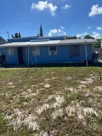 Image 4 - 719 49th St, West Palm Beach, Florida, 33407 - House for sale