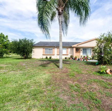 Buy this 3 bed house on 3102 Southwest Watson Court in Port Saint Lucie, FL 34953