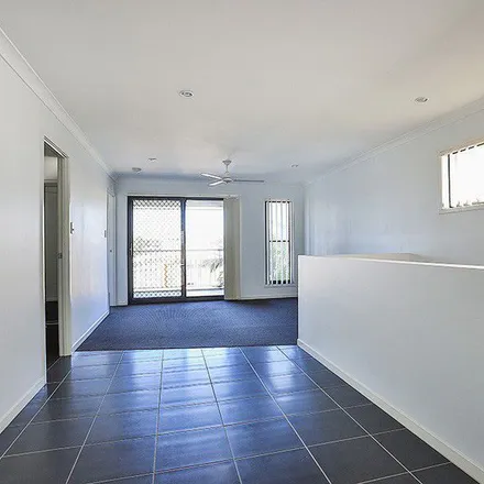 Rent this 4 bed apartment on 24 Brock Drive in Springfield Lakes QLD 4300, Australia