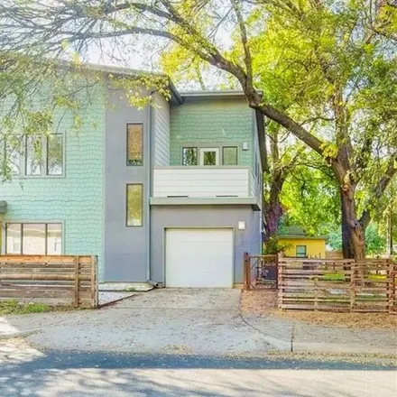 Rent this 3 bed house on 2024 E 2nd St Unit B in Austin, Texas