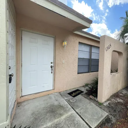 Rent this 3 bed townhouse on 1305 Hempstead Street in Wellington, Palm Beach County