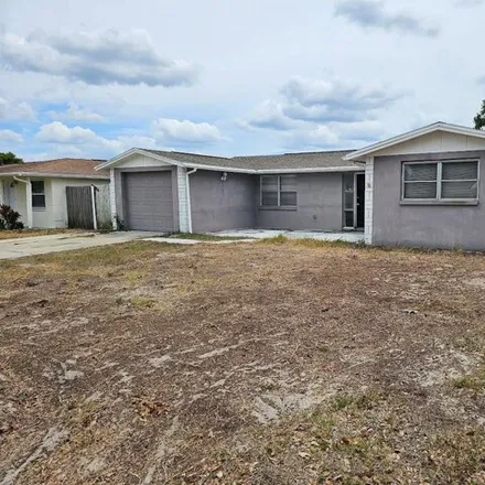Buy this 3 bed house on 3326 Darlington Road in Holiday, FL 34691