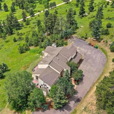 Buy this 5 bed house on 33487 Buffalo Park Rd in Evergreen, Colorado