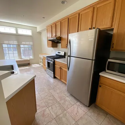 Rent this 4 bed townhouse on 8181 Skelton Circle in Merrifield, VA 22042