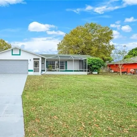 Rent this 3 bed house on 1614 Cheshire Circle West in Lehigh Acres, FL 33936