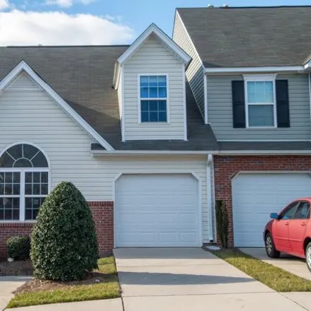 Buy this 2 bed townhouse on Song Sparrow Lane in Greensboro, NC 27409