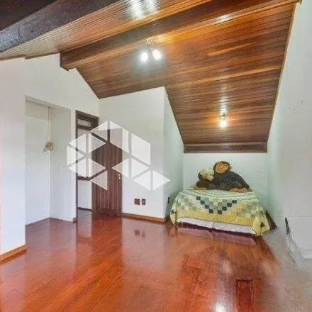 Buy this 3 bed house on Rua Ibirubá in Cavalhada, Porto Alegre - RS