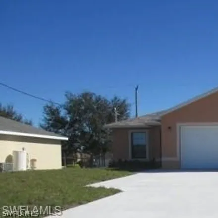 Rent this 3 bed duplex on 1319 Nelson Road North in Cape Coral, FL 33993