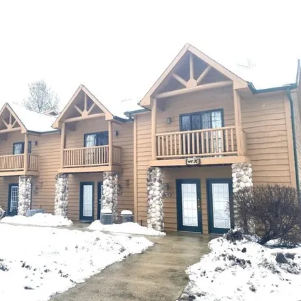 Buy this 2 bed house on Grizzly Jacks Grand Bear Resort in East 8th Road, North Utica