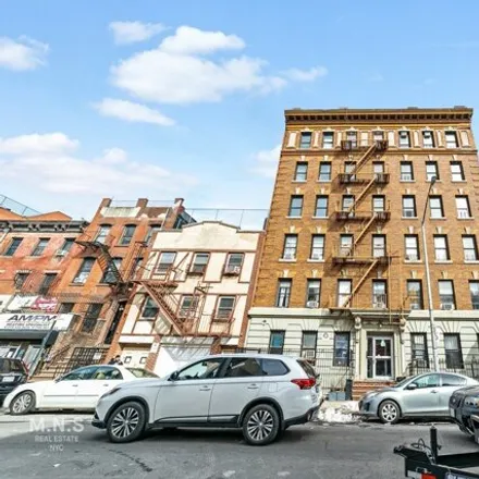 Rent this 3 bed house on 215 East 117th Street in New York, NY 10035