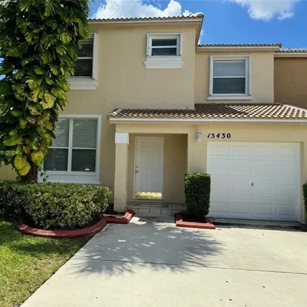 Rent this 3 bed townhouse on 15430 NW 12th Ct in Pembroke Pines, Florida