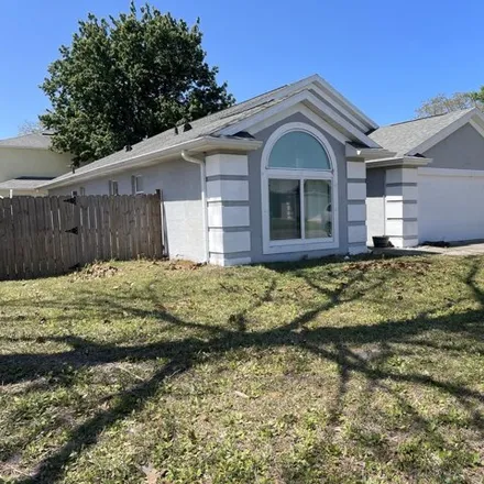 Rent this 3 bed house on 2391 Saint Andrews Dr; Saint Paul Drive in Titusville, FL 32780
