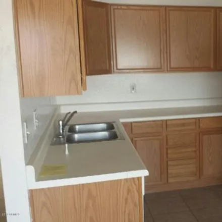 Rent this 2 bed apartment on 1499 East 26th Lane in Pinal County, AZ 85119