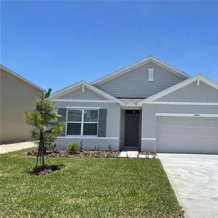 Rent this 4 bed house on 30943 Penny Surf Loop in Wesley Chapel, Florida