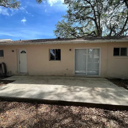 Rent this 4 bed apartment on 1418 Mango Tree Drive in Edgewater, FL 32132