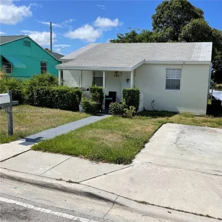 Buy this 2 bed house on 760 West 4th Street in Riviera Beach, FL 33404